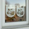 Zazdrostka świąteczna z Mikołajem na saniach zaprzężonych w renifery